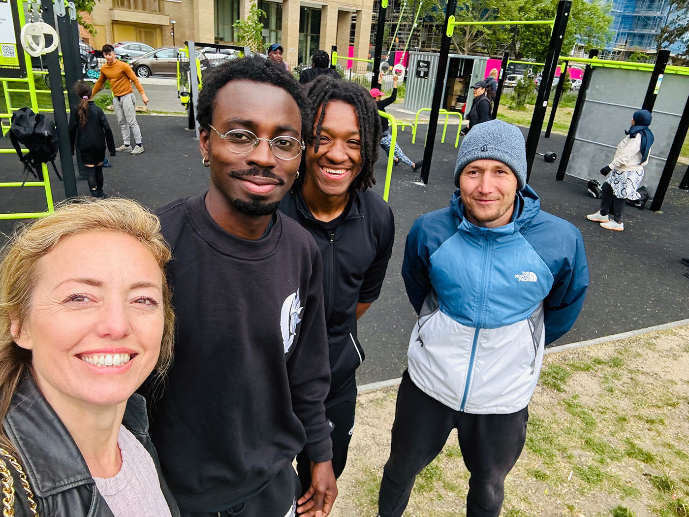 four people taking a selfie at a TGO gym