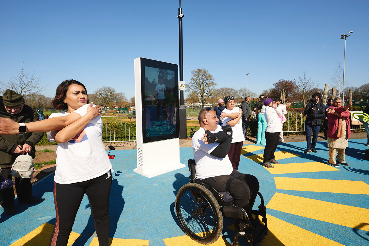 group of people exercising at a TGO gym